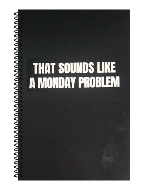 That Sounds Like a Monday Problem funny spiral notebook in black (Corporate Black) – 5.5 x 8.5 inch college ruled office notebook by Office Snarky